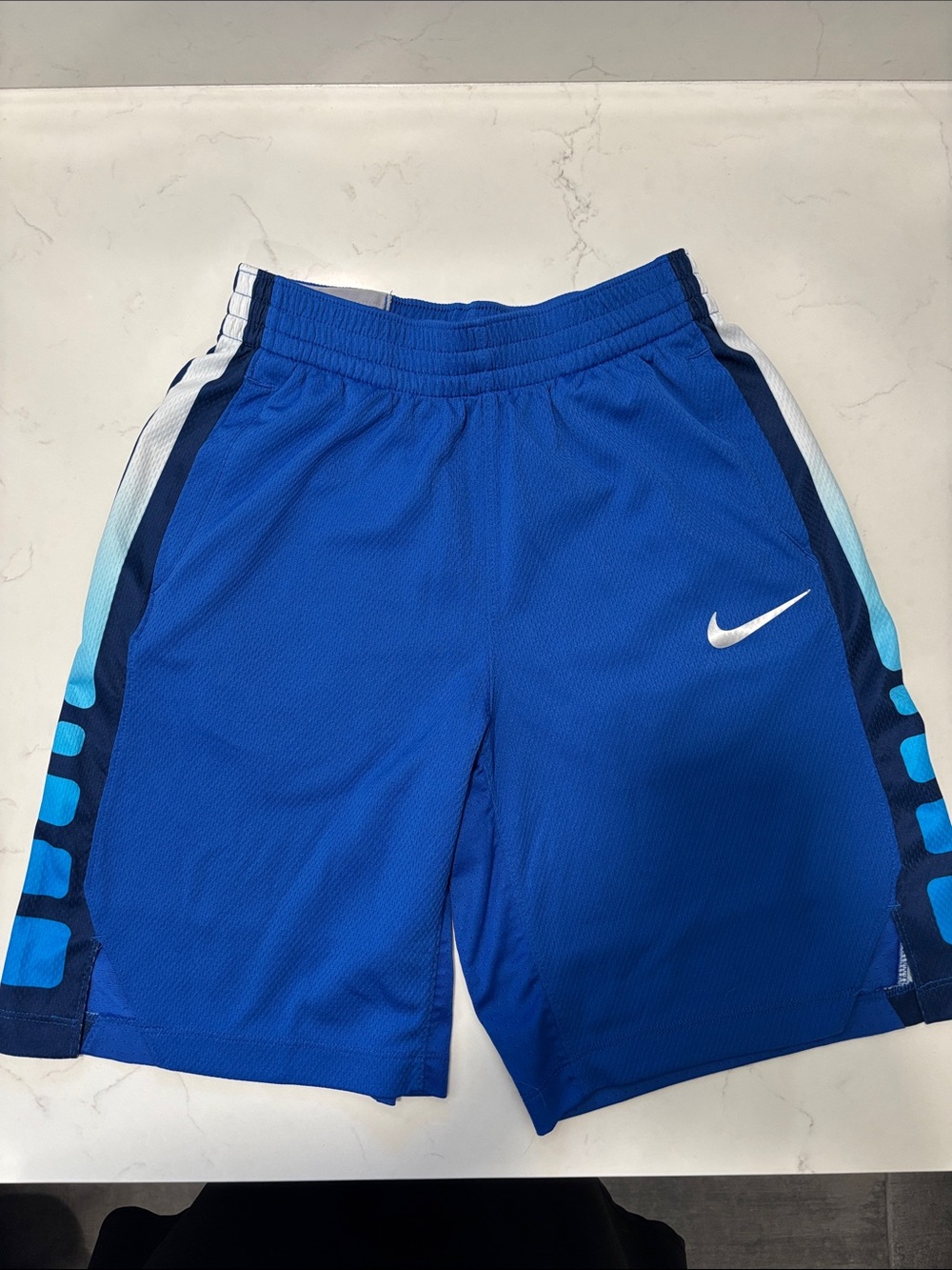 Nike Blue Athletic Basketball Shorts with White Swoosh